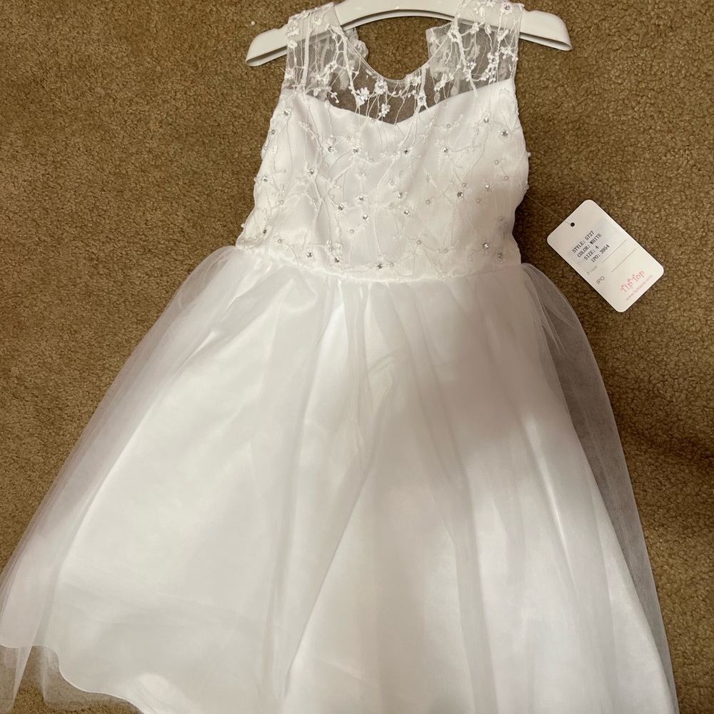 White dress bought for my daughter for her baptism, did not wear it after all
